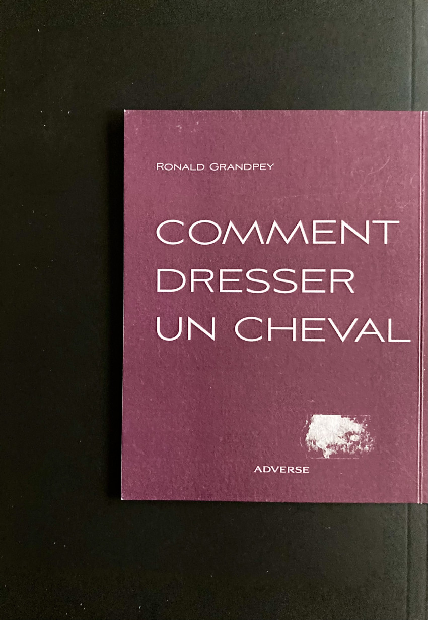 Verso de l'album Comment dresser un cheval